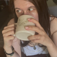yo tomando café
